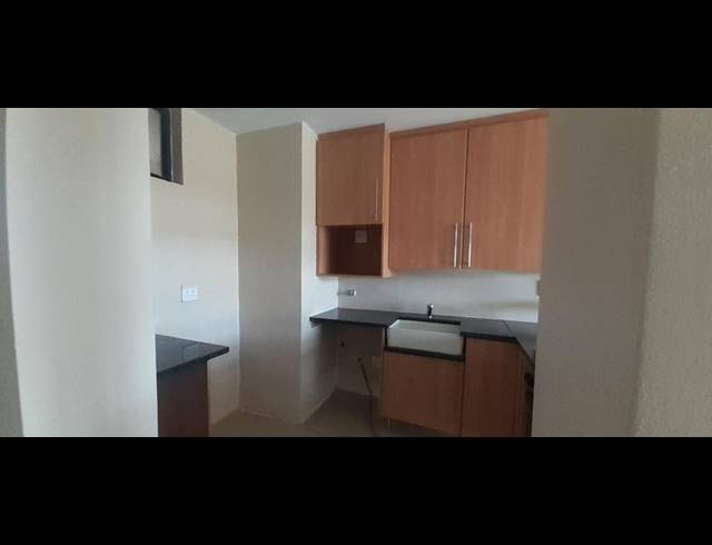 2 BEDROOM APARTMENT FOR SALE IN ROOIHUISKRAAL NORTH